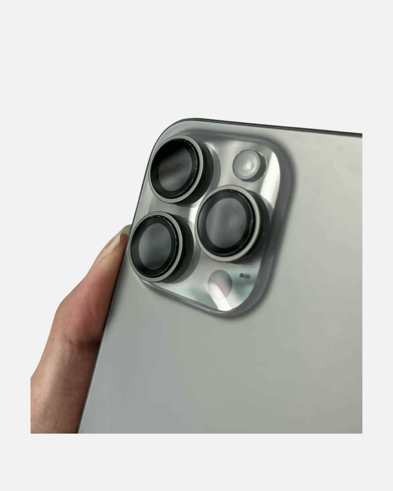 Close-up of iPhone 16 Pro camera lens with 9H tempered glass protector for enhanced photo quality and scratch resistance.