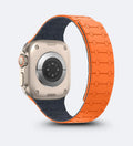 Apple Watch Magnetic link with a dual-tone band on a light gray background Orange - Creslia