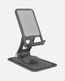 Adjustable foldable phone stand with non-slip base for smartphones and tablets, perfect for desks and travel.