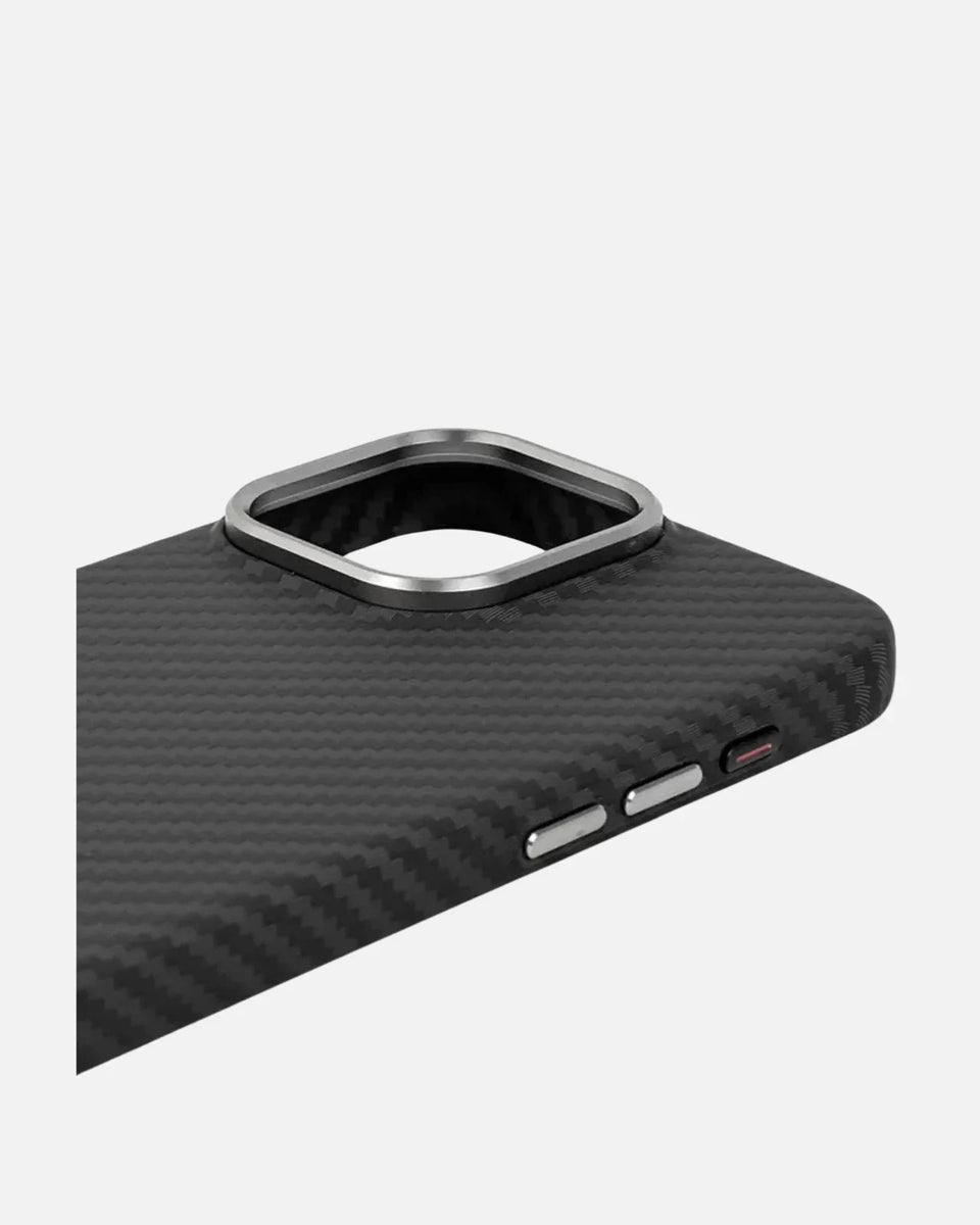 Close-up of MagSafe ultra-thin aramid fiber iPhone case with metal camera frame and textured finish.