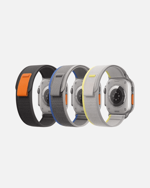 Trail Loop Apple Watch bands in black, blue, and gray, showcasing lightweight, breathable, and adjustable features.